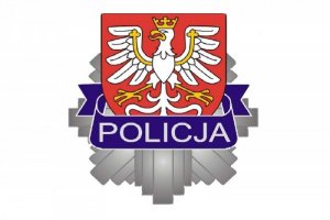 logo komendy wojewódzkiej Policji w Krakowie z blachą policyjną oraz godłem małopolski na białym tle