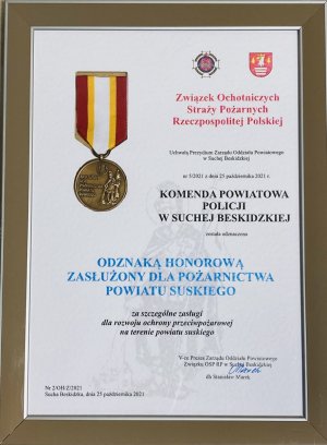 dyplom wraz z odznaką